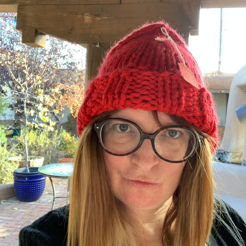 Red acrylic winter knit beanie