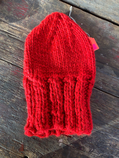 Red acrylic winter knit beanie