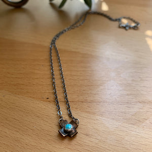 Dainty turquoise and. bronze criss cross necklace